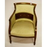 AN EDWARDIAN INLAID ROSEWOOD ARMCHAIR, the padded back with a centre concave marquetry inlaid panel,