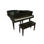 A VERY GOOD EBONISED BABY GRAND PIANO, by Sohmer, with iron frame, 48" (122cm) keyboard, raised on