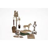 A MISCELLANEOUS COLLECTION OF BRASSWARE, comprising a pair of candlesticks; a door stop in the