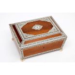 A FINE REGENCY PERIOD ANGLO-INDIAN VIZAGAPATAM IVORY AND SANDALWOOD SEWING BOX