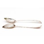 A PAIR OF IRISH GEORGE III BRIGHT CUT SILVER TABLE SPOONS, each with shell bowl, Dublin c.1770,