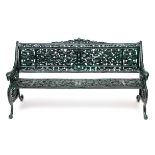 A VERY FINE PAIR OF PIERCED HEAVY CAST IRON GARDEN BENCHES IN THE COALBROOKDALE STYLE, green