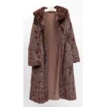 A THREE-QUARTER LENGTH LADIES FUR COAT, size 12/14. (1)