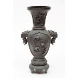 A TALL JAPANESE BRONZE VASE, Meiji period, the flaring neck with relief panels depicting birds