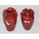 A PAIR OF 19TH CENTURY RED GROUND VODREY POTTERY GLAZED VASES, probably Frederick Vodrey of