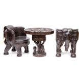 A VERY UNUSUAL SET OF FOUR EBONISED AND CARVED WOODEN ARMCHAIRS, each formed with an elephant mask