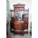 AN INLAID ROSEWOOD MIRROR BACK CHIFFONIER, the shaped pediment inlaid with urns and drapes, above