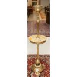 A LATE 19TH OR EARLY 20TH CENTURY BRASS STANDARD OIL LAMP, now converted for electricity, the reeded