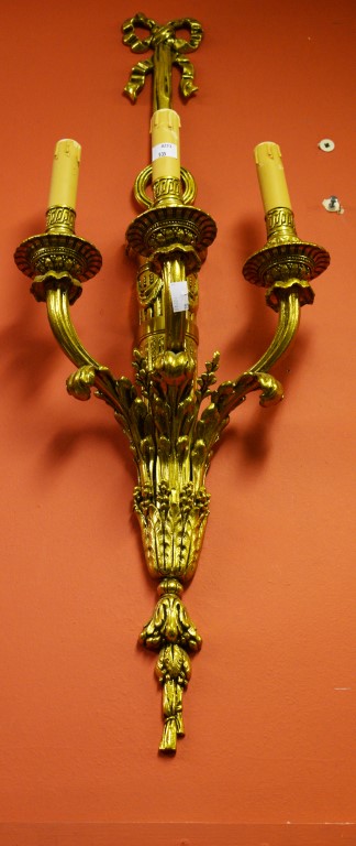 A FINE SET OF FOUR HEAVY THREE-BRANCH GILT-BRASS WALL LIGHTS, each in the Adam's style and crested