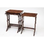 A NEST OF THREE REGENCY STYLE YEW-WOOD OCCASIONAL TABLES, each with graduating rectangular top,