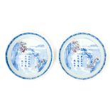 A PAIR OF VERY SMALL CIRCULAR BLUE, WHITE, AND BROWN DISHES, each decorated with a landscape, the