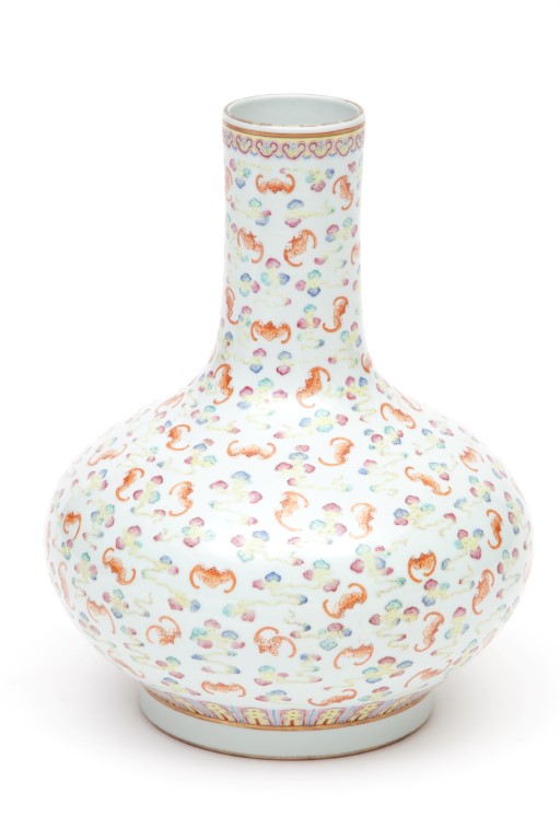 A CHINESE PORCELAIN BOTTLE VASE, decorated with bats, in iron red, yellow, blue and pink, against - Image 2 of 2