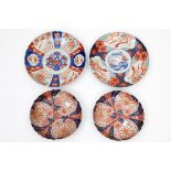 A COLLECTION OF JAPANESE IMARI PORCELAIN, comprising a pair of circular lobed dishes, decorated in