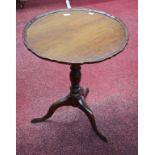 A MAHOGANY FLIP-TOP CENTRE OR OCCASIONAL TABLE