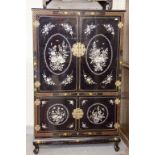 AN ATTRACTIVE BLACK LACQUERED MOTHER-O-PEARL INLAID SIDE CUPBOARD, O.R.M., in the Chinoiserie style,