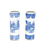 A PAIR OF CHINESE BLUE AND WHITE CYLINDRICAL VASES, early 20th century, 12" (31cm) high. (2)