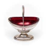 A HEAVY BRIGHT CUT AND PIERCED SILVER SUGAR BASKET, London late 19th century on oval domed foot,