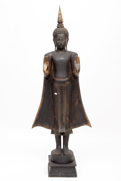 A CARVED, EBONISED AND PARCEL GILT FIGURE OF A BUDDHA, with flowing gown and hands facing forward, - Image 2 of 2