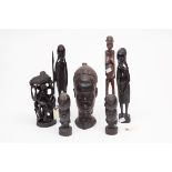 A COLLECTION OF AFRICAN CARVED HARDWOOD TRIBAL FIGURES, including a figural group, the tallest, 13.