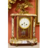 A FRENCH WHITE VARIEGATED MARBLE MANTEL CLOCK