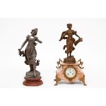 A FRENCH MARBLE AND GILT METAL MOUNTED MANTEL CLOCK, surmounted with a bronze spelter figure of a