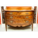 AN EDWARDIAN MAHOGANY BOW-FRONTED CHEST, with three long drawers on square tapering legs, 41.5" (