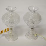 A PAIR OF WATERFORD CUT CRYSTAL TABLE LAMPS, each with globular shade, on single knop stem and domed