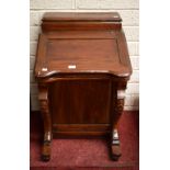 A VICTORIAN STYLE MAHOGANY DAVENPORT, O.R.M., with hinged stationary compartment and sloping