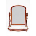 A VICTORIAN SWING-FRAME MAHOGANY DRESSING TABLE MIRROR, with spiral reeded supports and serpentine