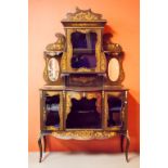 AN EDWARDIAN INLAID MAHOGANY CHIFFONIER, with shaped inlaid pediment with brass mounts, above a