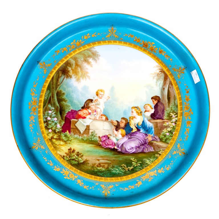 A LARGE CIRCULAR FRENCH SERVE STYLE PORCELAIN DISH, with central scene depicting a family group in a