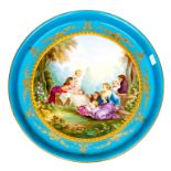 A LARGE CIRCULAR FRENCH SERVE STYLE PORCELAIN DISH, with central scene depicting a family group in a