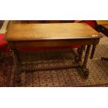 A RECTANGULAR VICTORIAN MAHOGANY SIDE OR CENTRE TABLE, with moulded top and plain frieze, raised