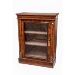 A VICTORIAN INLAID WALNUT SIDE CABINET, the rectangular moulded top above a glazed door, flanked