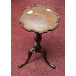 A SMALL MAHOGANY PIE-CRUST WINE TABLE