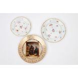 TWO SIMILAR ENGLISH PORCELAIN CABINET PLATES, one decorated with figures in an interior, after a