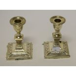 A PAIR OF LATE VICTORIAN SILVER DWARF CANDLESTICKS, in the Adam's Revival Style, by Harrison