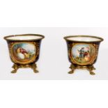 A PAIR OF ATTRACTIVE FRENCH SEVRES STYLE COBALT GROUND PORCELAIN AND BRASS-MOUNTED JARDINIERES