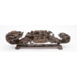 A LARGE INTRICATELY CARVED WOODEN CHINESE GROUP, carved in deep relief, with numerous figures and