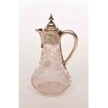 A FERN ENGRAVED GLASS CLARET JUG, with silver-plated mount, spout and handle, 11.75" (30cm) high. (