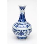 A FINE CHINESE BLUE AND WHITE PORCELAIN VASE, decorated with bands of scrolling foliage, blue six-