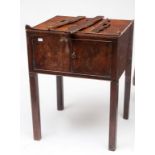 A GEORGE III PERIOD MAHOGANY BEDSIDE TRAY-TOP POT CUPBOARD, with three-quarter gallery and two