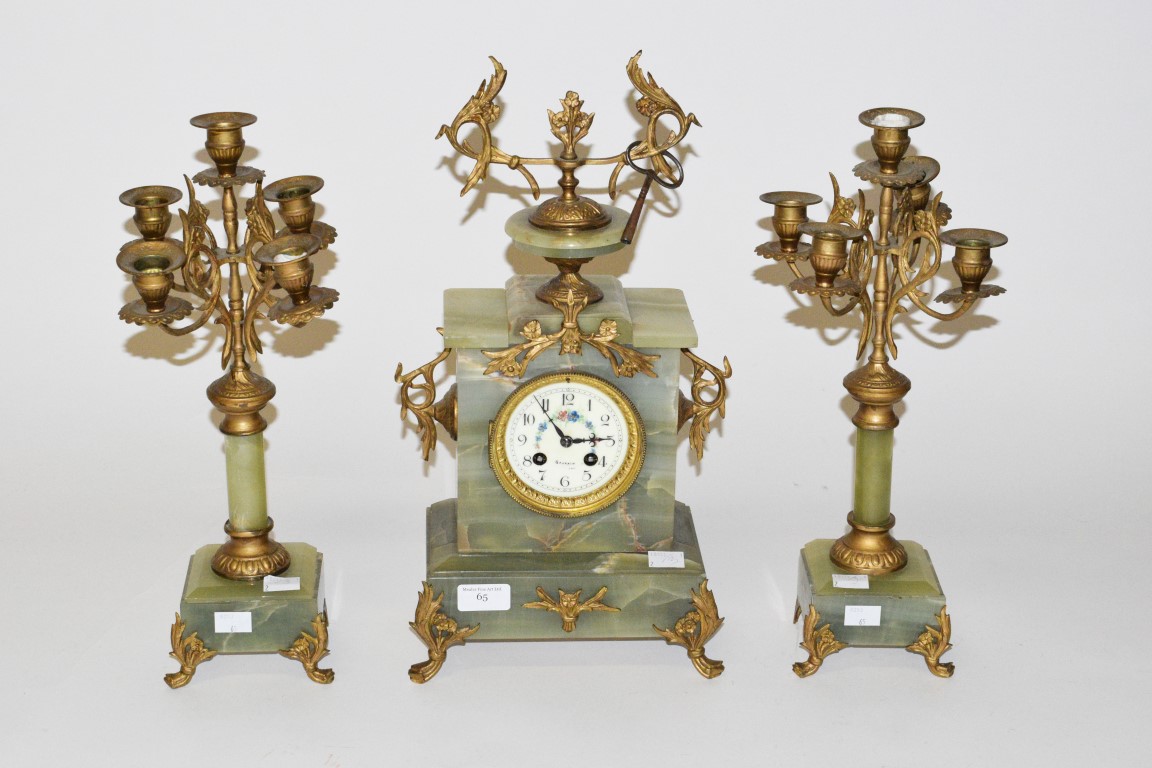 A THREE-PIECE FRENCH GREEN ONYX AND GILT METAL MANTEL CLOCK GARNITURE, the clock case with an urn