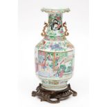 A FINE 19TH CENTURY CANTONESE PORCELAIN VASE, decorated with panels, figures, balconies and flowers,