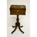 AN UNUSUAL REGENCY PERIOD INLAID ROSEWOOD AND GRAINED ROSEWOOD TEA-POY, the casket-shaped top