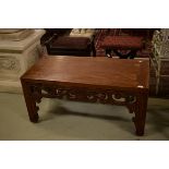 A SOUTHEAST ASIAN RECTANGULAR ALTER-TYPE OCCASIONAL TABLE, with pierced and carved frieze, raised on