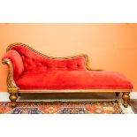 A VICTORIAN MAHOGANY CHAISE LONGUE, with single scroll end and padded back, above a padded seat,