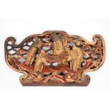 A 19TH CENTURY CHINESE CARVED PAINTED AND PARCEL GILT CREST OR PANEL, depicting Immortals and