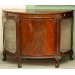 A BOW-FRONTED MAHOGANY DEMI-LUNE SIDE CABINET