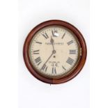 A CIRCULAR 19TH CENTURY WALL CLOCK, the painted dial signed Frengley Bros Limited Dublin, with the